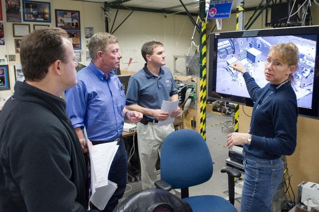 NASA image: EVA training for Exp. 27 crew member Ron Garan, Exp. 28 Mike Fossum and STS-135 Doug Hurley, Rex Walheim and Sandra Magnus   