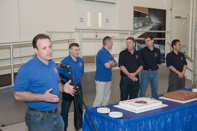 NASA image: Expedition 27/28 Cake Cutting Ceremony in building 5 high bay