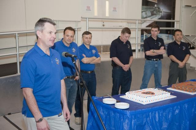 NASA image: Expedition 27/28 Cake Cutting Ceremony in building 5 high bay