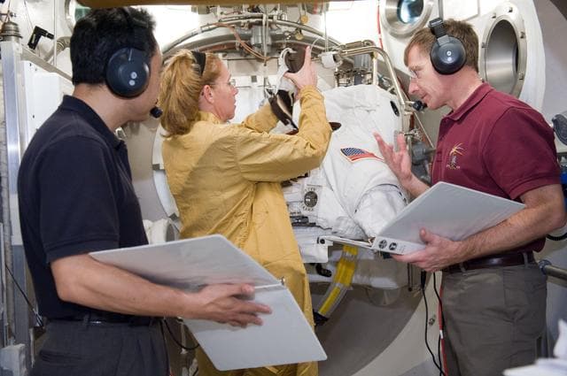NASA image:  SSATA Crew Training and EMU Verification for STS-135 astronaut Sandra Magnus.    