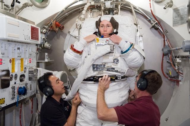 NASA image:  SSATA Crew Training and EMU Verification for STS-135 astronaut Sandra Magnus.    
