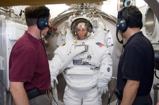 NASA image:  SSATA Crew Training and EMU Verification for STS-135 astronaut Sandra Magnus.    