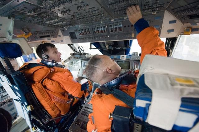 NASA image: STS-135 crew and training team during ASC/CAP/DES