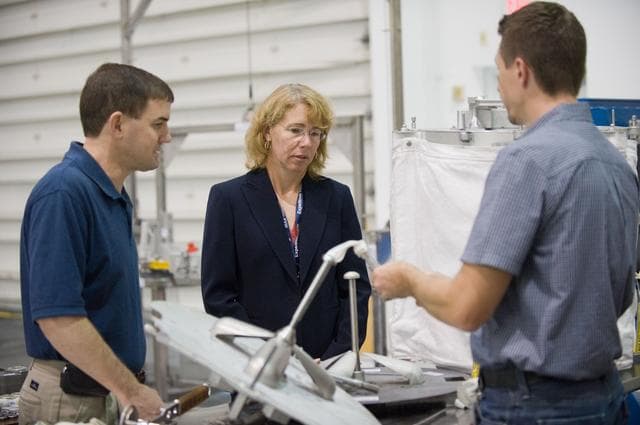 NASA image: STS-135 crew members Rex Walheim and Sandra Magnus during EVA TPS OPS at 1G Trainer at the NBL.