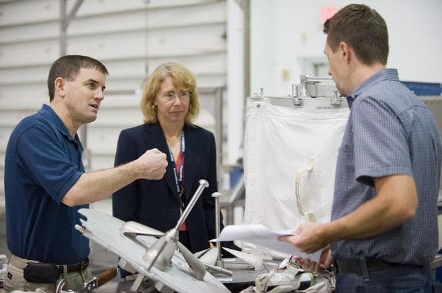 NASA image: STS-135 crew members Rex Walheim and Sandra Magnus during EVA TPS OPS at 1G Trainer at the NBL.