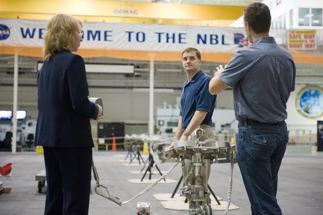 NASA image: STS-135 crew members Rex Walheim and Sandra Magnus during EVA TPS OPS at 1G Trainer at the NBL.