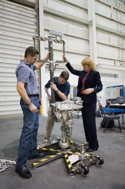 NASA image: STS-135 crew members Rex Walheim and Sandra Magnus during EVA TPS OPS at 1G Trainer at the NBL.
