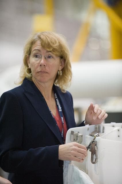 NASA image: STS-135 crew members Rex Walheim and Sandra Magnus during EVA TPS OPS at 1G Trainer at the NBL.