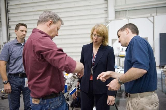 NASA image: STS-135 crew members Rex Walheim and Sandra Magnus during EVA TPS OPS at 1G Trainer at the NBL.
