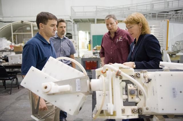 NASA image: STS-135 crew members Rex Walheim and Sandra Magnus during EVA TPS OPS at 1G Trainer at the NBL.