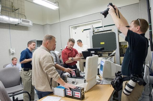 NASA image: STS-135 crew during various training exercises in Space Station Training Facility 