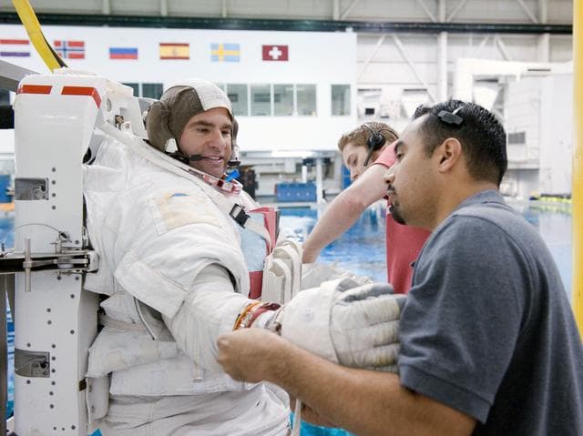 NASA image: STS-134 crew members Michael Fincke and Greg Chamitoff during their final EVA4 training run at the NBL. 