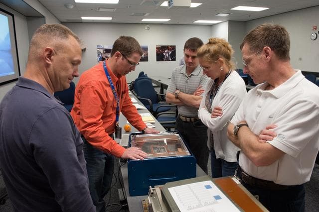 NASA image: STS-135 crew during AEM (Animal Enclosure Module) training