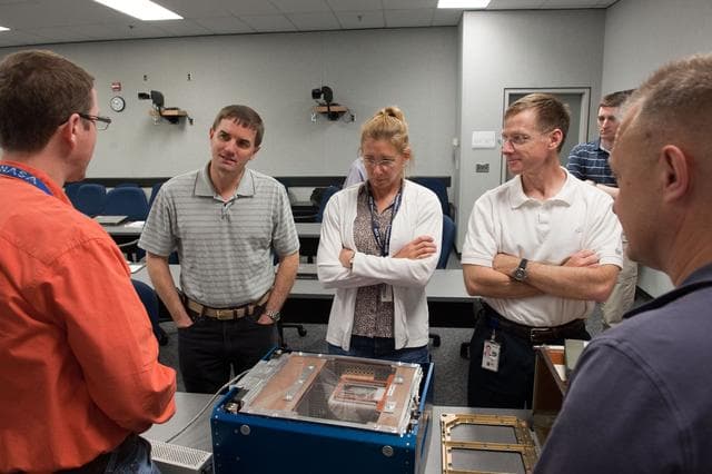 NASA image: STS-135 crew during AEM (Animal Enclosure Module) training