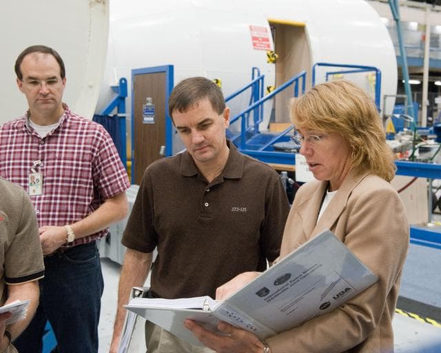 NASA image: STS-135 crew during Ingress/Egress Timeline training in building 9NW space station mockups    