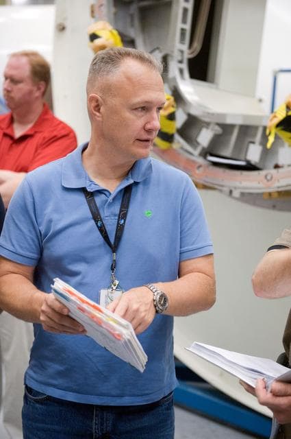NASA image: STS-135 crew during Ingress/Egress Timeline training in building 9NW space station mockups    