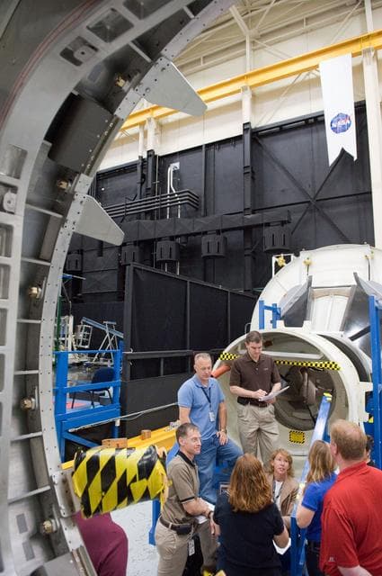 NASA image: STS-135 crew during Ingress/Egress Timeline training in building 9NW space station mockups    