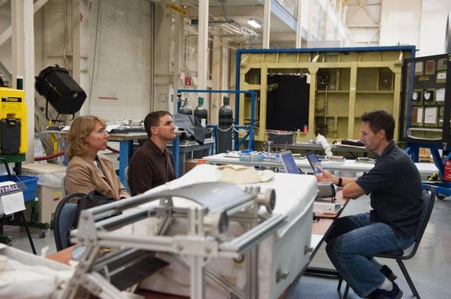 NASA image: STS-135 crew during Ingress/Egress Timeline training in building 9NW space station mockups    