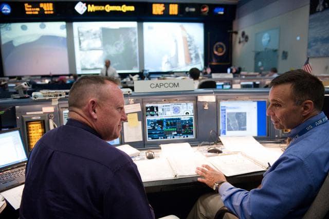 NASA image: STS-134 Flight Controllers on Console - Launch. Flight Director: Richard Jones    