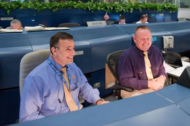 NASA image: STS-134 Flight Controllers on Console - Launch.