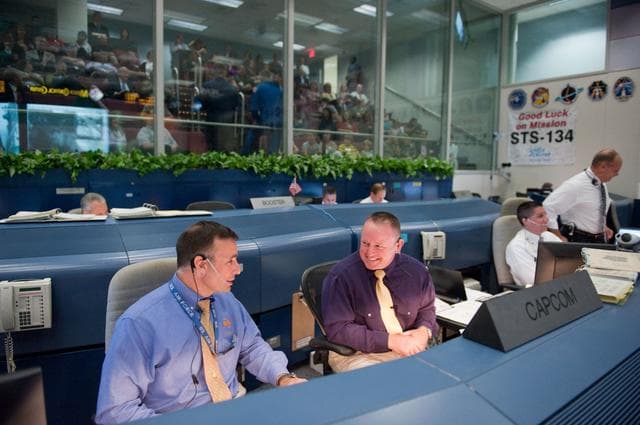 NASA image: STS-134 Flight Controllers on Console - Launch.
