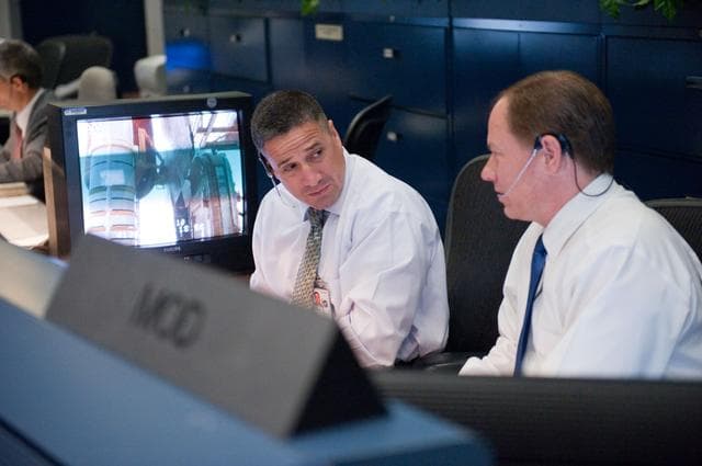 NASA image: STS-134 Flight Controllers on Console - Launch.