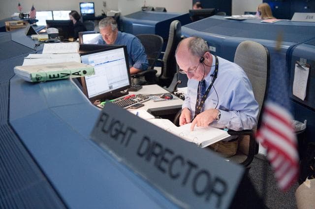 NASA image: STS-134 Orbit 2 flight controllers on consoles