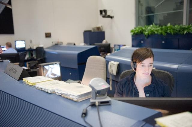 NASA image: STS-134 Orbit 1 flight controllers on console during AMS install 