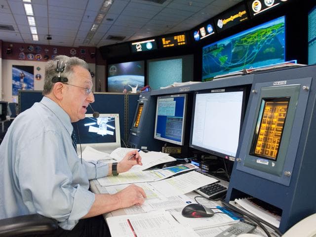 NASA image: STS-134 Flight Controllers on Console, Orbit 3, Flight Director Rick Labrode   