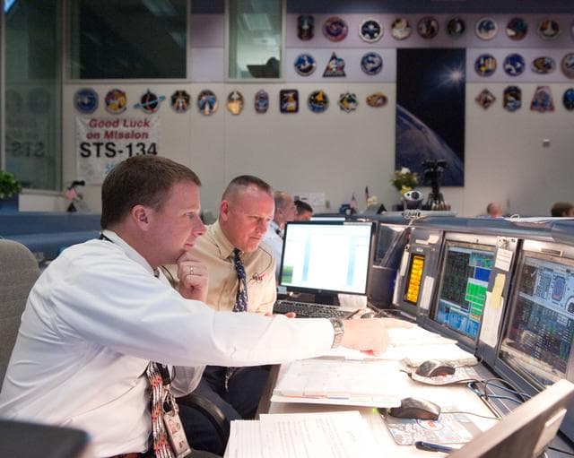 NASA image: STS-134 Flight Controllers on Console - Landing