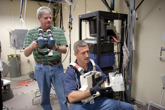 NASA image: Expedition 29/30 astronaut Dan Burbank during SAFER Proficiency Training in the VR Lab.    