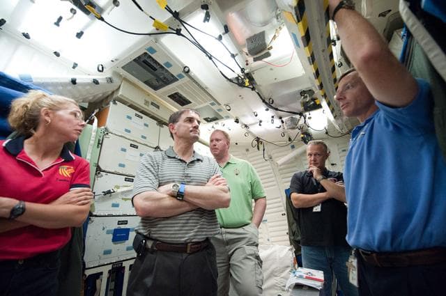 NASA image:  STS-135 Escape System Refresher training and Stowage Review Training 