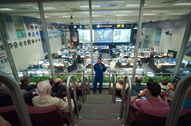 NASA image: STS135 flight controllers on console during last shuttle mission