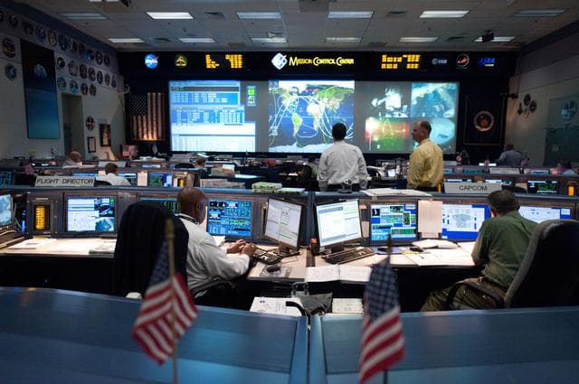 NASA image: STS-135 Flight Controllers on Console. Shift: SSP Orbit 1/ISS Orbit 2 EVA     