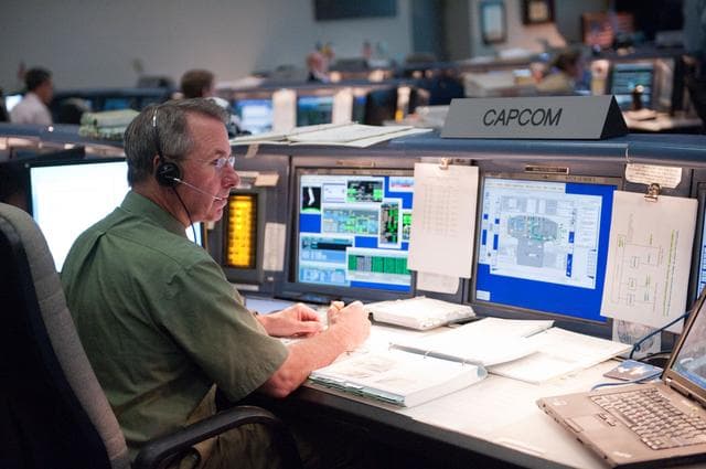 NASA image: STS-135 Flight Controllers on Console. Shift: SSP Orbit 1/ISS Orbit 2 EVA     