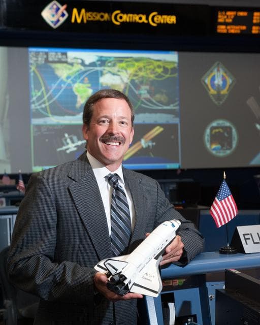 NASA image: STS-135 Flight Controllers on Console 