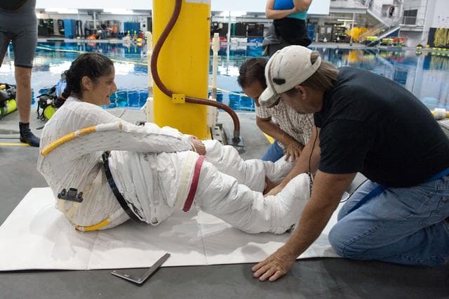 NASA image: Expedition 32 crew members Suni Williams and Aki Hoshide conduct pre-test briefings