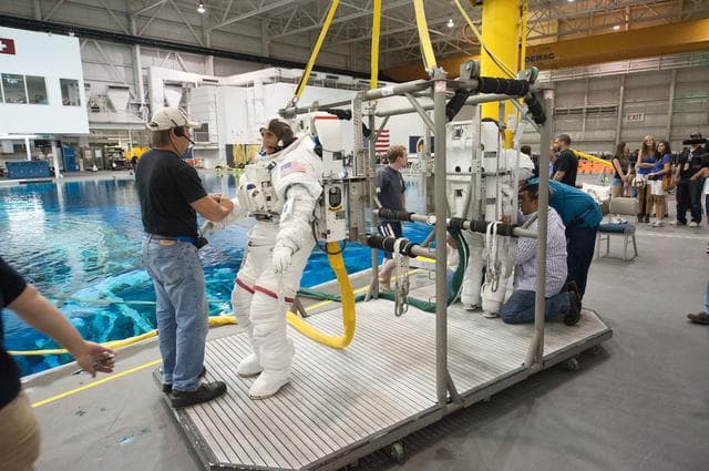 NASA image: Expedition 32 crew members Suni Williams and Aki Hoshide conduct pre-test briefings