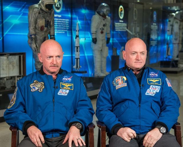 NASA image: Mark and Scott Kelly talk to news media