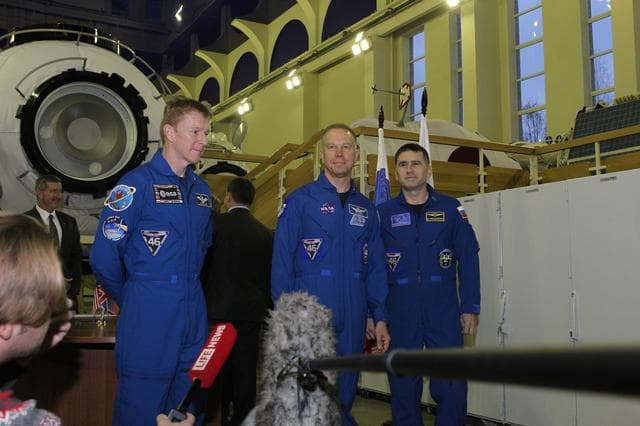 NASA image: At the Gagarin Cosmonaut Training Center in Star City, Russia, Expedition 46-47 prime crewmembers Tim Peake of the European Space Agency (left), Tim Kopra of NASA (center) and Yuri Malenchenko of the Russian Federal Space Agency (Roscosmos, right) answer reporters��� questions Nov. 19 at the start of two days of qualification exams. They will launch Dec. 15 in the Soyuz TMA-19M spacecraft from the Baikonur Cosmodrome in Kazakhstan for a six-month mission on the International Space Station..NASA/Seth Marcantel