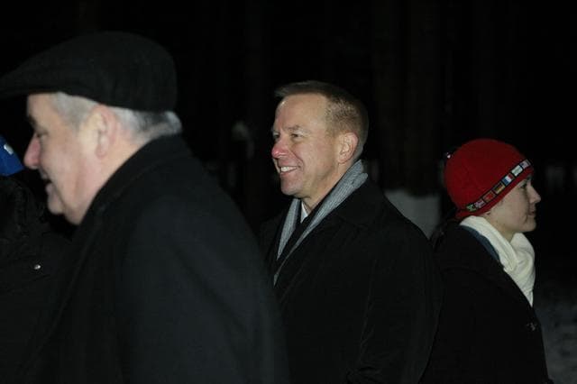 NASA image: At the Gagarin Cosmonaut Training Center in Star City, Russia, Expedition 46-47 crewmember Tim Kopra of NASA flashes a smile Nov. 30 in advance of his departure for his launch site at the Baikonur Cosmodrome in Kazakhstan. Kopra, Tim Peake of the European Space Agency and Yuri Malenchenko of the Russian Federal Space Agency (Roscosmos) will launch Dec. 15 in their Soyuz TMA-19M spacecraft for a six-month mission on the International Space Station..NASA / Seth Marcantel