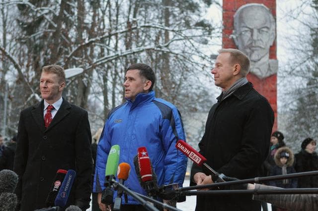 NASA image: At the Gagarin Cosmonaut Training Center in Star City, Russia, Expedition 46-47 crewmembers Tim Peake of the European Space Agency (left), Yuri Malenchenko of the Russian Federal Space Agency (Roscosmos, center) and Tim Kopra of NASA (right) answer reporters��� questions Nov. 30 in front of the statue of Vladimir Lenin before departing for their launch site at the Baikonur Cosmodrome in Kazakhstan. Malenchenko, Kopra and Tim Peake of the European Space Agency will launch Dec. 15 in their Soyuz TMA-19M spacecraft for a six-month mission on the International Space Station..NASA / Seth Marcantel