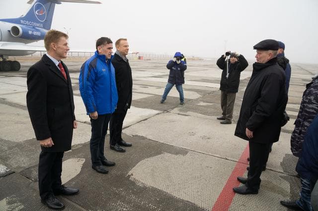 NASA image: The Expedition 46-47 crewmembers arrive in Baikonur, Kazakhstan Nov. 30 for final pre-launch training following a flight from their training base at the Gagarin Cosmonaut Training Center in Star City, Russia. Tim Peake of the European Space Agency (left), Yuri Malenchenko of the Russian Federal Space Agency (Roscosmos, center) and Tim Kopra of NASA (right) will launch Dec. 15 on the Soyuz TMA-19M spacecraft for a six-month mission on the International Space Station...NASA / Victor Zelentsov.