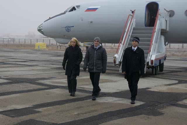 NASA image: The Expedition 46-47 backup crewmembers arrive in Baikonur, Kazakhstan Nov. 30 for final pre-launch preparations. Kate Rubins of NASA (left), Anatoly Ivanishin of the Russian Federal Space Agency (Roscosmos, center) and Takuya Onishi of the Japan Aerospace Exploration Agency (JAXA, right) will serve as backups to the prime crewmembers, Tim Peake of the European Space Agency, Yuri Malenchenko of the Russian Federal Space Agency (Roscosmos) and Tim Kopra of NASA, who will launch Dec. 15 on the Soyuz TMA-19M spacecraft for a six-month mission on the International Space Station...NASA / Victor Zelentsov.