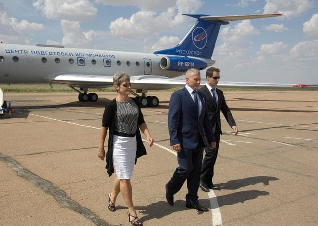 NASA image: ISS Expedition 48-49 backup crewmembers Peggy Whitson of NASA (left), Oleg Novitskiy of Roscosmos (center) and Thomas Pesquet of the European Space Agency (right) arrive in Baikonur, Kazakhstan June 24 following a flight from their training base in Star City, Russia. Prime crewmembers Kate Rubins of NASA, Anatoly Ivanishin of Roscosmos and Takuya Onishi of the Japan Aerospace Exploration Agency will launch July 7 from the Baikonur Cosmodrome in Kazakhstan on the Soyuz MS-01 spacecraft for a planned four-month mission on the International Space Station...NASA/Alexander Vysotsky.
