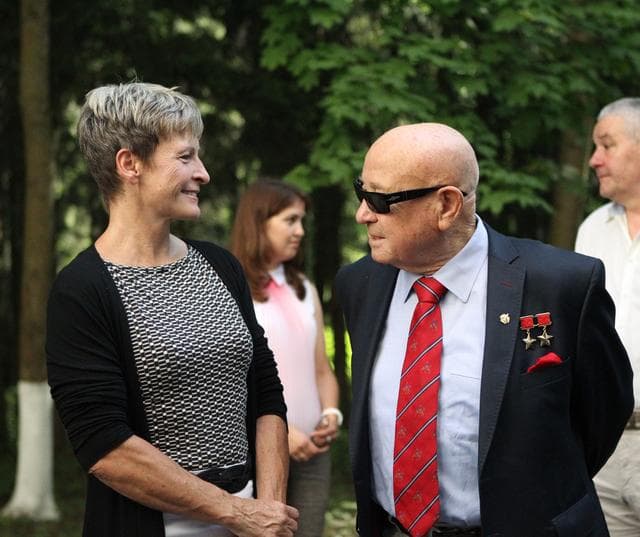 NASA image: At the Gagarin Cosmonaut Training Center in Star City, Russia, ISS Expedition 48-49 backup crewmember Peggy Whitson of NASA (left) shares a lighthearted moment June 24 with legendary cosmonaut Alexey Leonov, the first human to walk in space, as Whitson and other crewmembers departed for their launch site at the Baikonur Cosmodrome in Kazakhstan. Prime crewmembers Kate Rubins of NASA, Anatoly Ivanishin of Roscosmos and Takuya Onishi of the Japan Aerospace Exploration Agency will launch July 7 from the Baikonur Cosmodrome in Kazakhstan on the Soyuz MS-01 spacecraft for a planned four-month mission on the International Space Station...NASA/Stephanie Stoll.