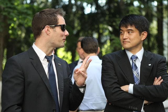 NASA image: At the Gagarin Cosmonaut Training Center in Star City, Russia, ISS Expedition 48-49 backup crewmember Thomas Pesquet of the European Space Agency (left) shares a moment with prime crewmember Takuya Onishi of the Japan Aerospace Exploration Agency June 24 before heading to their launch site at the Baikonur Cosmodrome in Kazakhstan. Prime crewmembers Kate Rubins of NASA, Anatoly Ivanishin of Roscosmos and Onishi will launch July 7 from the Baikonur Cosmodrome in Kazakhstan on the Soyuz MS-01 spacecraft for a planned four-month mission on the International Space Station...NASA/Stephanie Stoll.