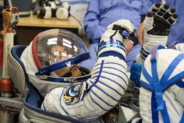 NASA image: In the Integration Facility at the Baikonur Cosmodrome in Kazakhstan, Expedition 48-49 crewmember Takuya Onishi of the Japan Aerospace Exploration Agency conducts a leak check of his Russian Sokol launch and entry suit June 25 as part of the preparations for launch with Anatoly Ivanishin of Roscosmos and Kate Rubins of NASA on July 7, Baikonur time, on the Soyuz MS-01 spacecraft for a planned four-month mission on the International Space Station...GCTC/Andrei Shelepin.