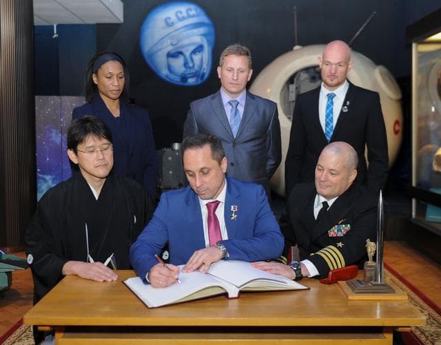 NASA image: jsc2017e136047 - At the Gagarin Cosmonaut Training Center in Star City, Russia, Expedition 54-55 prime crewmember Anton Shkaplerov of the Russian Federal Space Agency (Roscosmos) signs a ceremonial book Nov. 30 as part of traditional pre-launch ceremonies