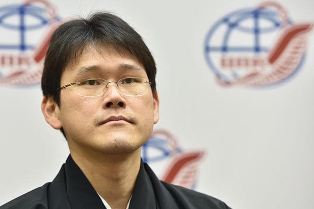 NASA image: jsc2017e136049 - At the Gagarin Cosmonaut Training Center in Star City, Russia, Expedition 54-55 prime crewmember Norishige Kanai of the Japan Aerospace Exploration Agency (JAXA) listens to a reporter’s question during a crew news conference Nov. 30. Ka